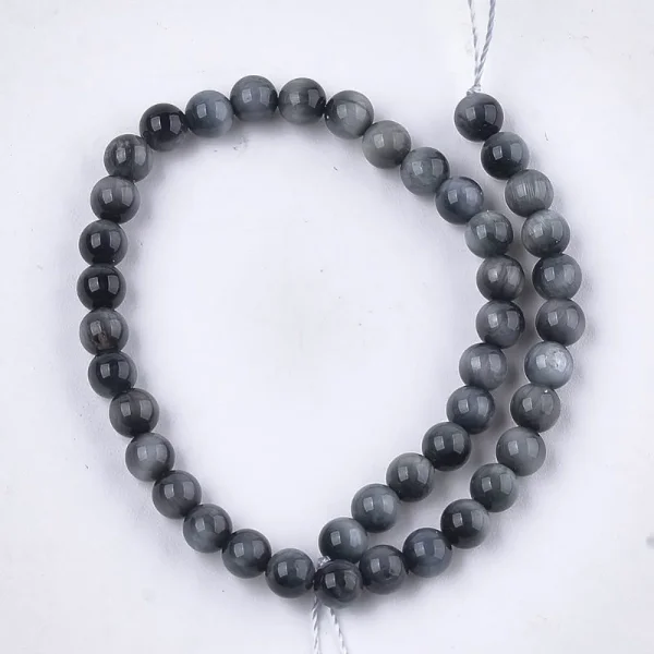 Natural hawkeye round shape beads (1/2 string)