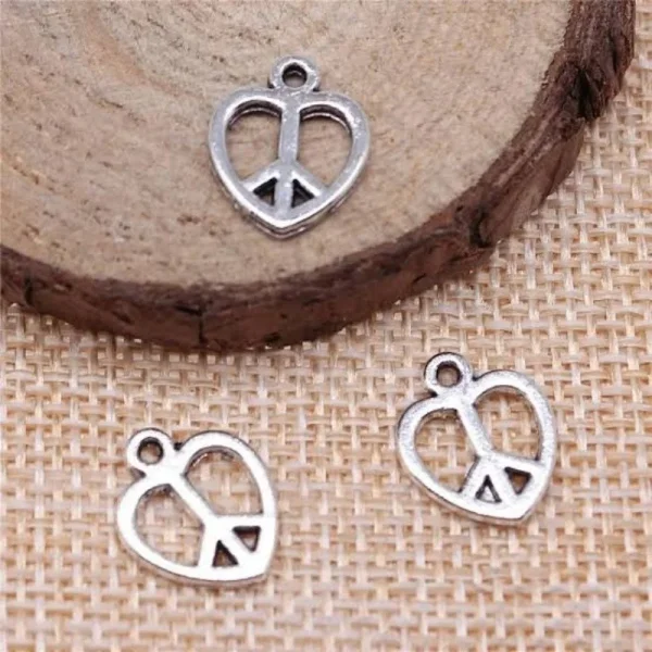 Metal alloy peace heart charm