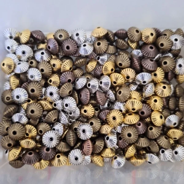 Metal alloy corrugated bicone spacer beads