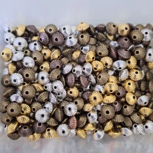 Metal alloy corrugated bicone spacer beads
