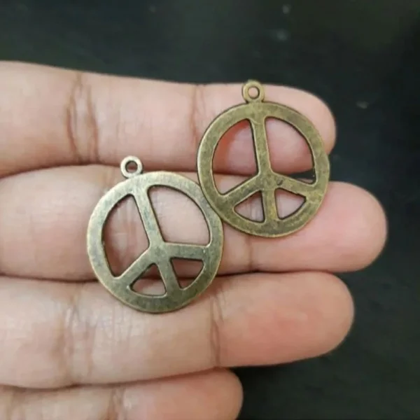 Metal alloy antique bronze peace sign charm
